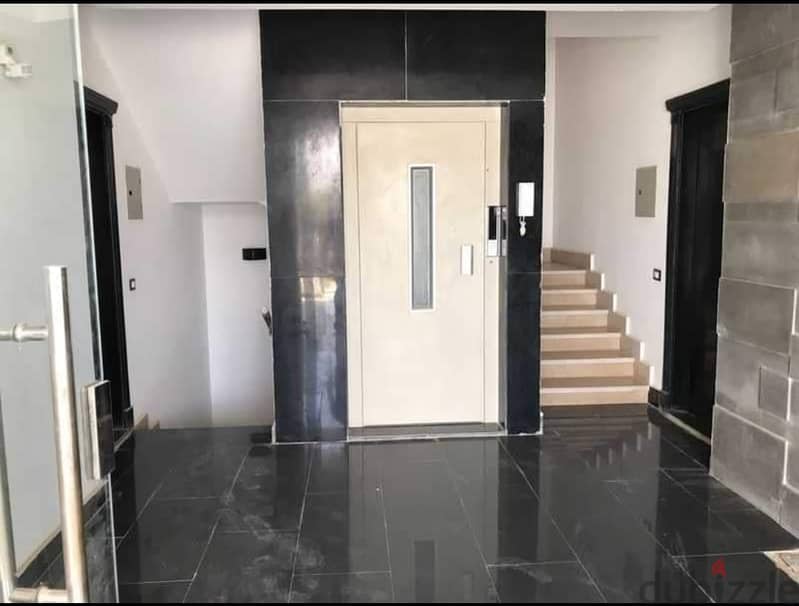Corner apartment for sale, 3 rooms, Taj City, New Cairo, in front of Cairo International Airport, in installments over 8 years, with a 70% discount 39