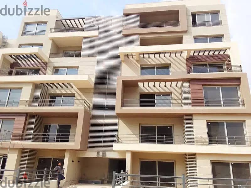 Apartment for sale with private garden, fully finished, with air conditioners  including maintenance, and are ready to move with an open view and l 4