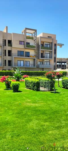 Apartment for sale with private garden, fully finished, with air conditioners The kitchen and appliances are less than the market price