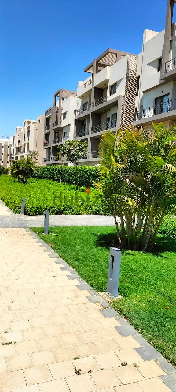 Apartment for sale with private garden, fully finished, with air conditioners The kitchen and appliances are less than the market price 2