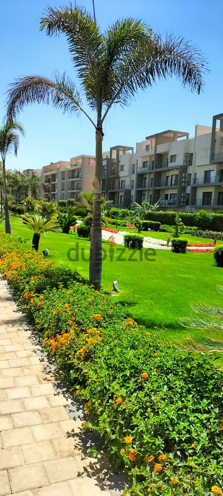 Apartment for sale with private garden, fully finished, with air conditioners The kitchen and appliances are less than the market price 3