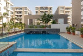 Private roof apartment in Taj City Compound, in a prime location in front of Cairo Airport, with a 10% down payment over 8 years, area of 115 roof 16