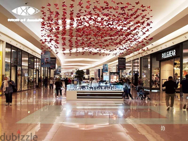 Ground floor shop, Pout area, 25 meters, with the lowest down payment and the longest payment period, in the only mall in the entertainment district i 8