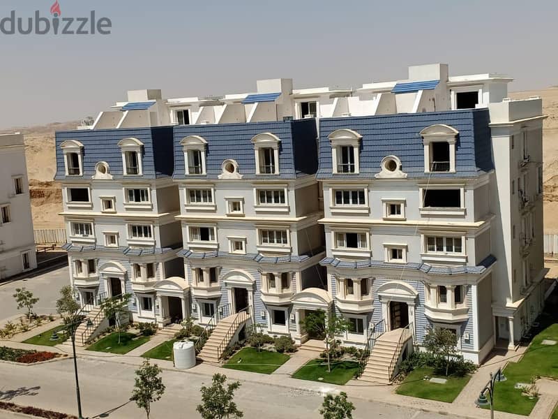 شقة أرضي بجاردن للبيع من Mountain view بالقرب من مدينتي بدون مقدم لفترة محدودة وقسط على 7 سنينGround floor apartment with garden for sale from M. V 11