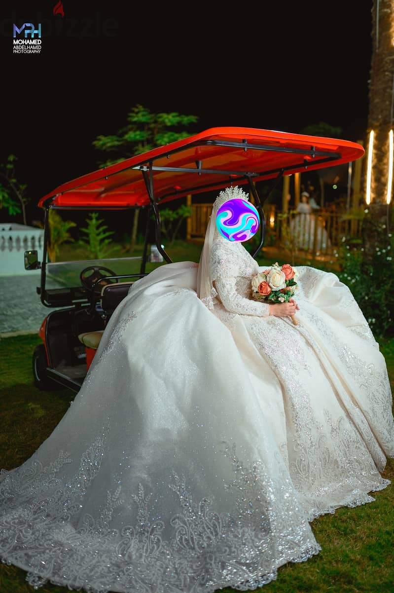 فستان زفاف جوميه بالطرحة 3