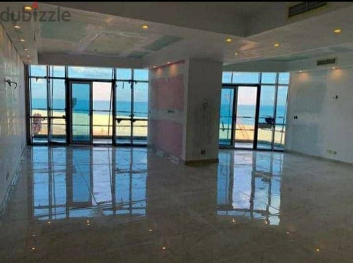 Distinctive apartment for sale, fully finished, with double sea and lagoon views in New Alamein Towers. 1