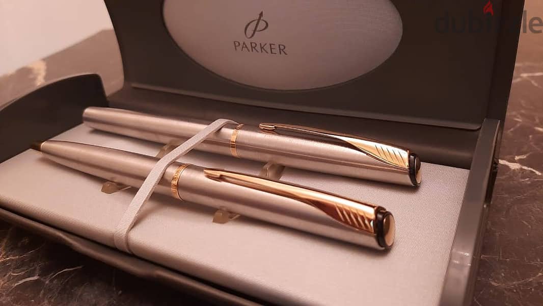 طقم أقلام ( Parker ) أصلي حبر وجاف بالعلبة الأصلية جديد لانج لم يستخدم 7