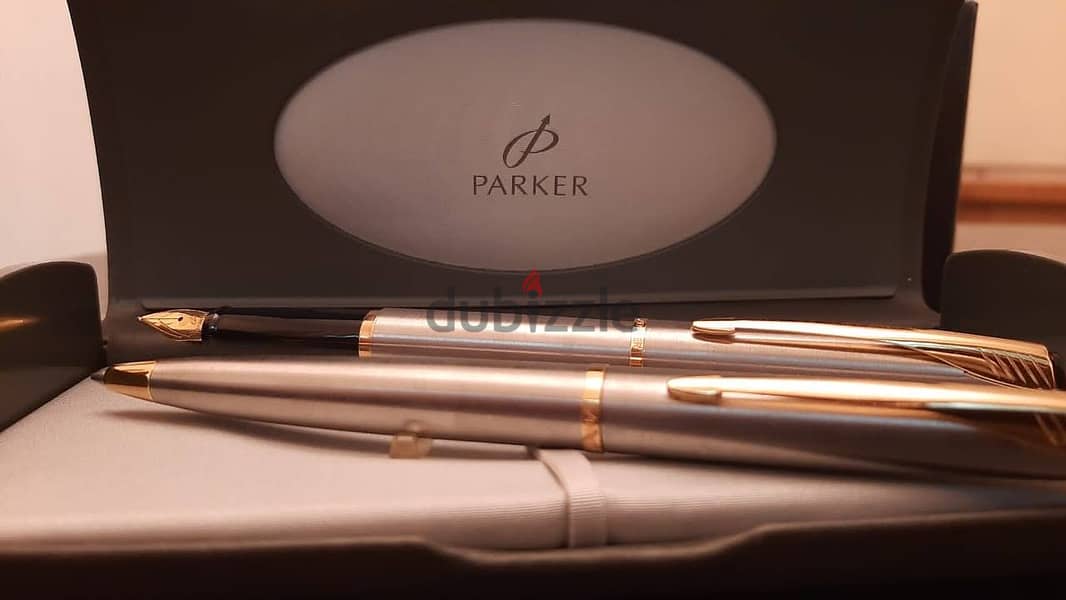 طقم أقلام ( Parker ) أصلي حبر وجاف بالعلبة الأصلية جديد لانج لم يستخدم 8