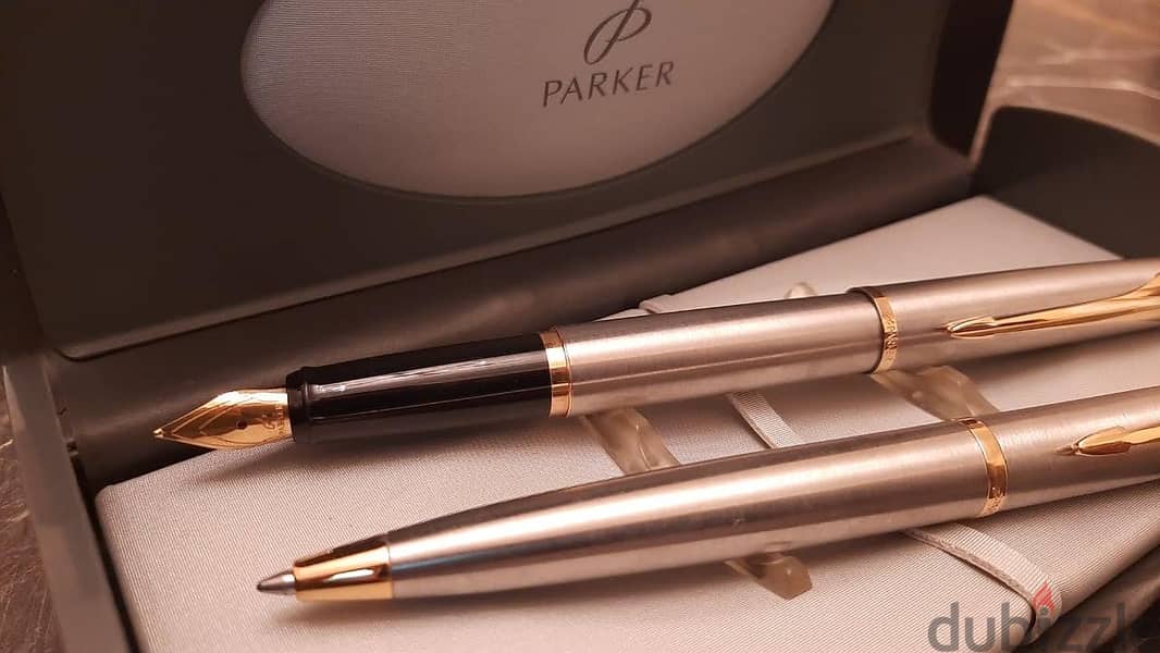 طقم أقلام ( Parker ) أصلي حبر وجاف بالعلبة الأصلية جديد لانج لم يستخدم 10