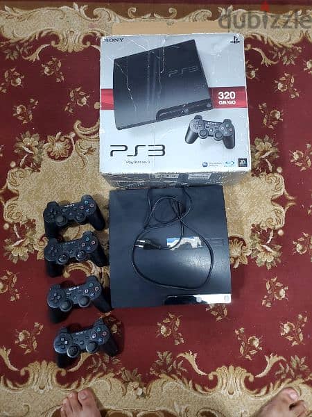 Playstation 3 with 4 controls 1