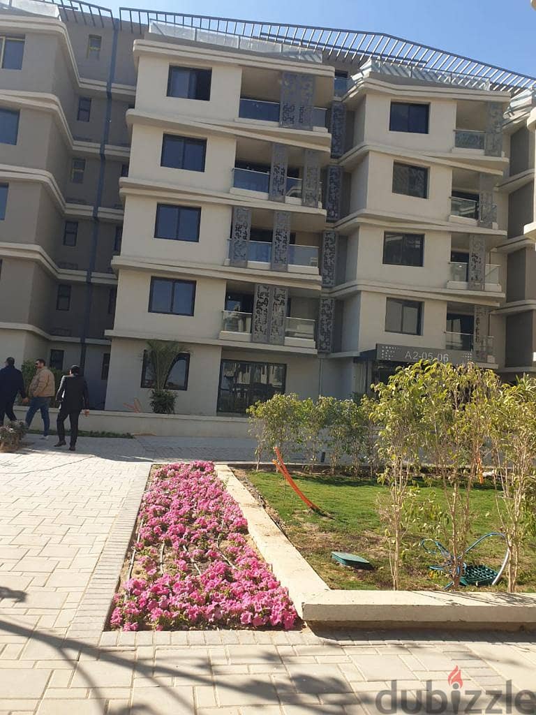 Ground apartment with garden for sale, fully finished, with air conditioners, in Badya Palm Hills October In installments 3