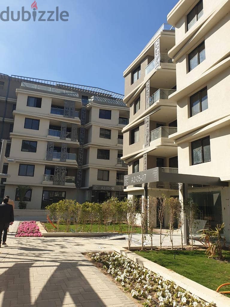 Ground apartment with garden for sale, fully finished, with air conditioners, in Badya Palm Hills October In installments 6