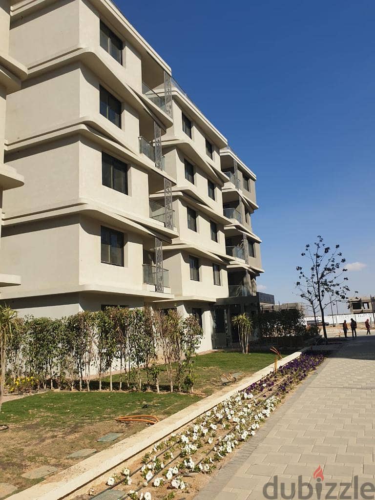 Ground apartment with garden for sale, fully finished, with air conditioners, in Badya Palm Hills October In installments 7