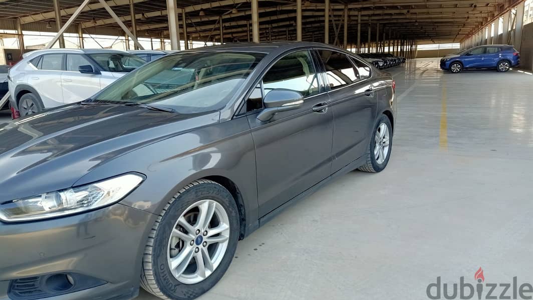 FORD FUSION - 2015 - GRAY - 111.000 KM - LICENSE END JUNE/2025 1