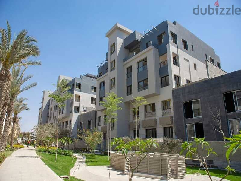 With only 5% down payment, an apartment with a garden of 155 meters in Trio Gardens Compound, with a 40% cash discount, with a view on the landscape 8