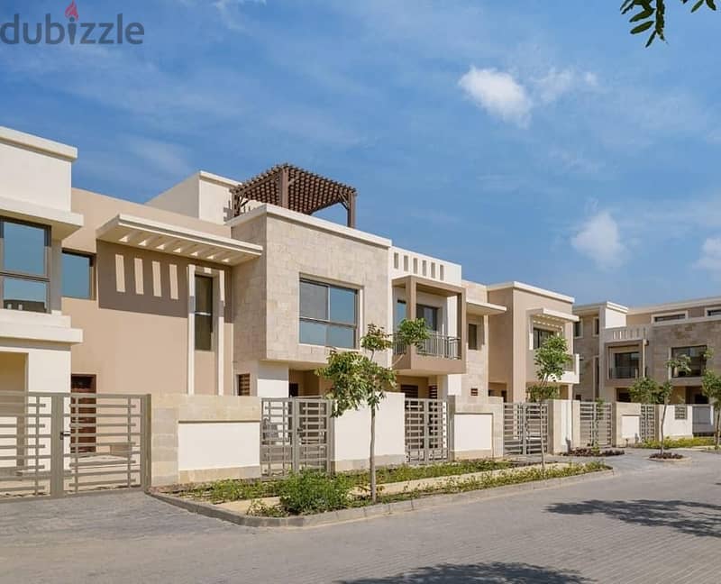 Quattro villa for sale in Taj City Compound in the New Settlement next to Swan Lake Hassan Allam 1