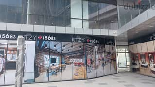 Shop for sale in Ritzy Mall, Sheikh Zayed, Immediate reciept internal area 51 sqm and external area 15 sqm, installments included