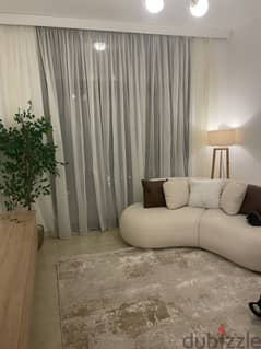 Furnished apartment for sale with air conditioners, prime location, landscaped view