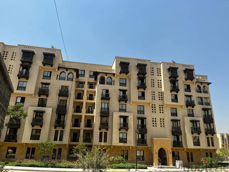 Immediately received a 124 sqm apartment (finished) in front of the Majar El Oyoun wall in the new city of Fustat, in installments over 7 years. 2