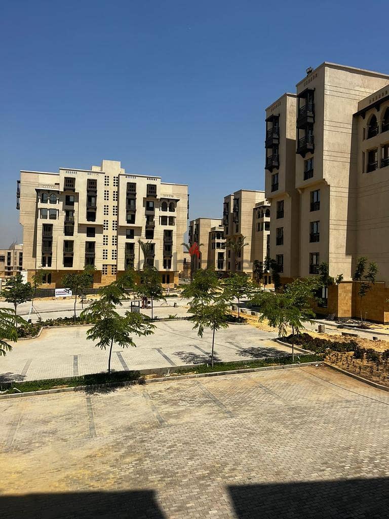 Immediately received a 124 sqm apartment (finished) in front of the Majar El Oyoun wall in the new city of Fustat, in installments over 7 years. 4