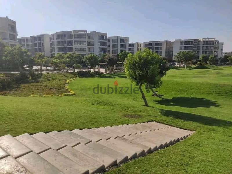 Double view corner apartment in Taj City Compound, area of ​​166 sqm, for sale, with a down payment of 590,000 and installments over 8 years 6