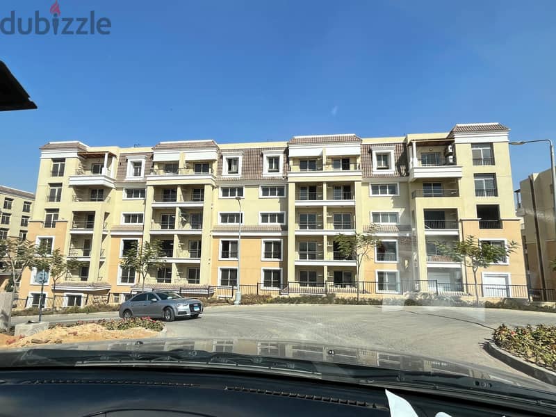 Two rooms, 105 sqm, ground floor, 68 sqm garden, for sale in Sarai Compound on Suez Road, intersection with Al Amal Axis, with a 10% down payment and 4