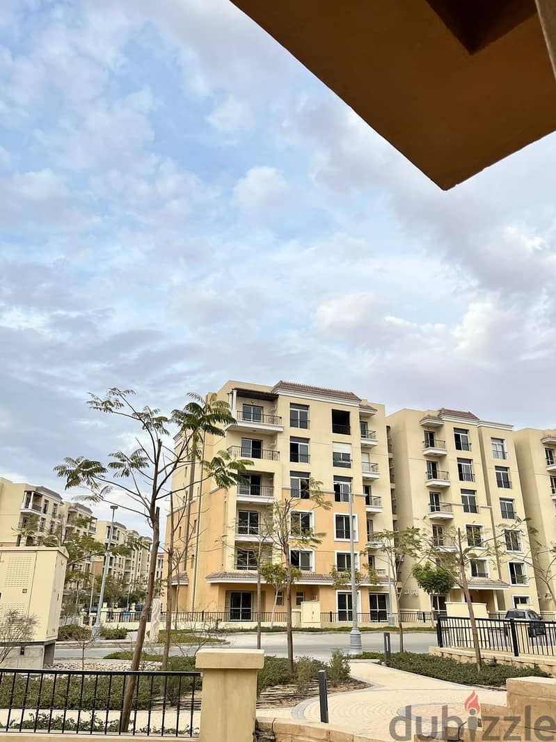 Two rooms, 105 sqm, ground floor, 68 sqm garden, for sale in Sarai Compound on Suez Road, intersection with Al Amal Axis, with a 10% down payment and 6