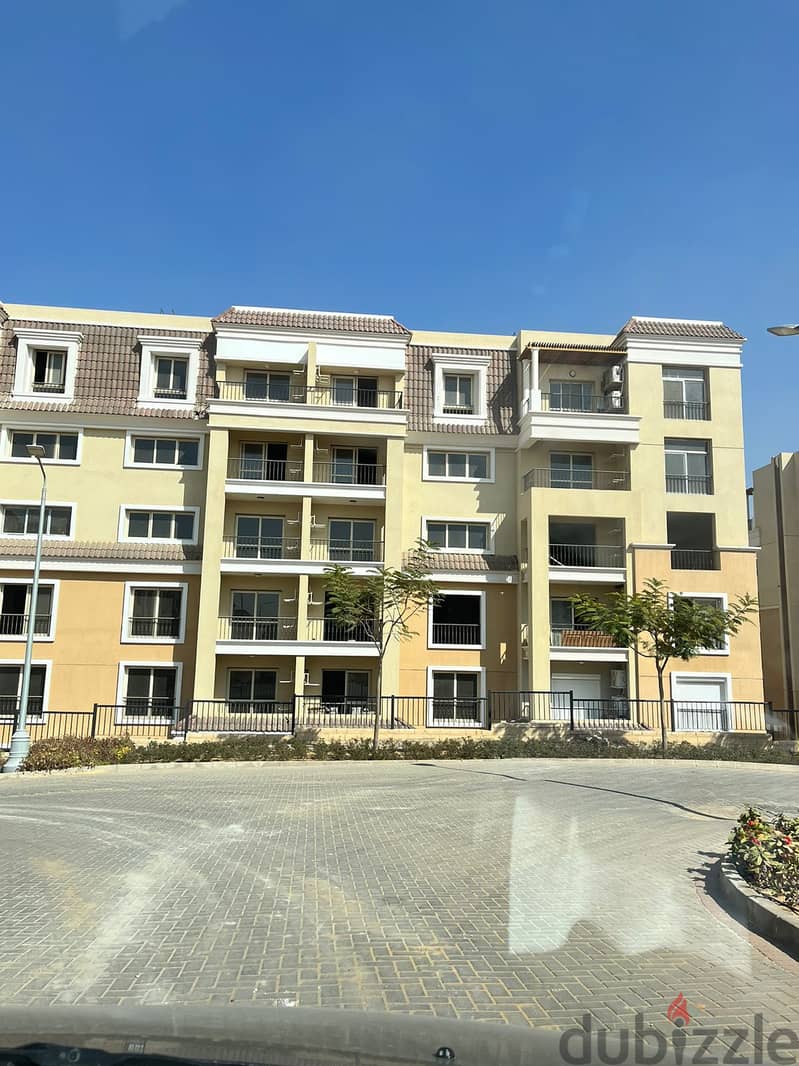 Two rooms, 105 sqm, ground floor, 68 sqm garden, for sale in Sarai Compound on Suez Road, intersection with Al Amal Axis, with a 10% down payment and 7