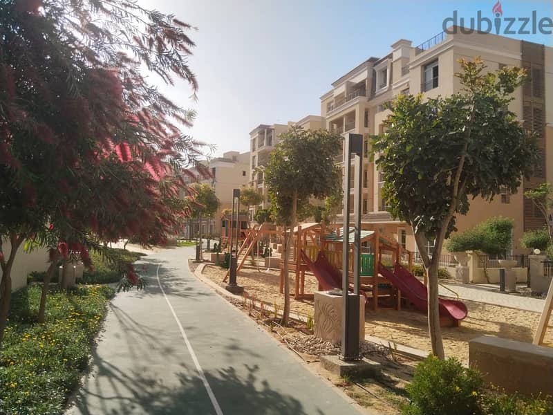 Two rooms, 105 sqm, ground floor, 68 sqm garden, for sale in Sarai Compound on Suez Road, intersection with Al Amal Axis, with a 10% down payment and 22