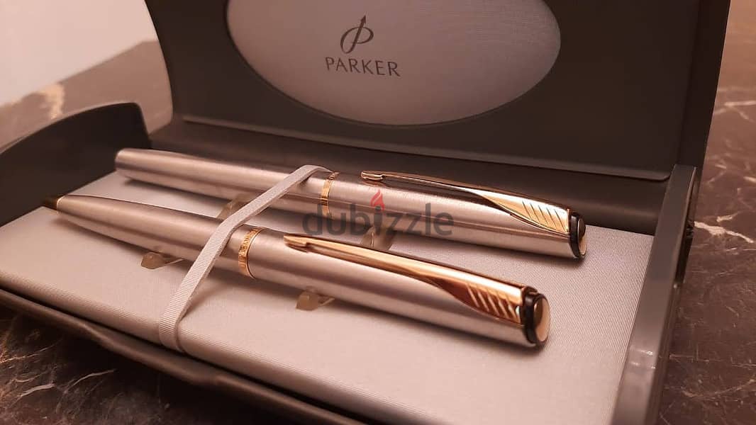 طقم أقلام ( Parker ) أصلي حبر وجاف بالعلبة الأصلية جديد لانج لم يستخدم 7