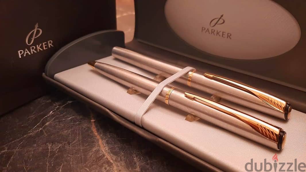 طقم أقلام ( Parker ) أصلي حبر وجاف بالعلبة الأصلية جديد لانج لم يستخدم 11