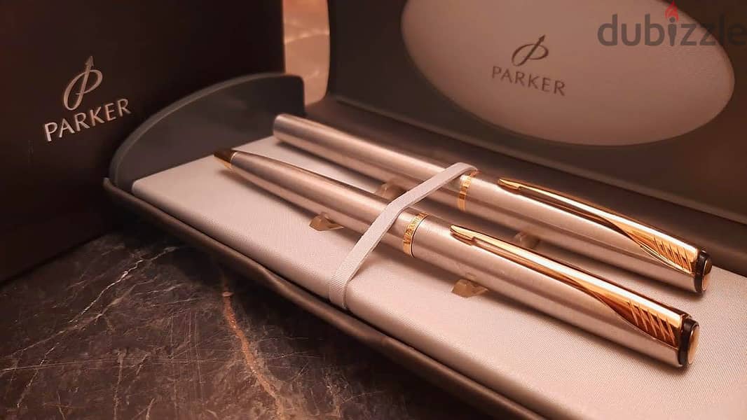 طقم أقلام ( Parker ) أصلي حبر وجاف بالعلبة الأصلية جديد لانج لم يستخدم 0