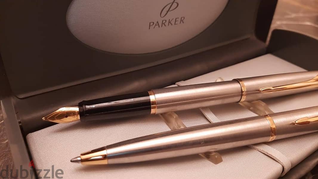 طقم أقلام ( Parker ) أصلي حبر وجاف بالعلبة الأصلية جديد لانج لم يستخدم 10