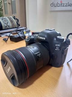 Barely used Canon EOS 5D Mark iv + lens EF25-70mm + flash