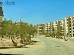 Apartment with garden for sale, ready to move 128 sqm, prime view, in Sarai Compound, Mostaqbal City