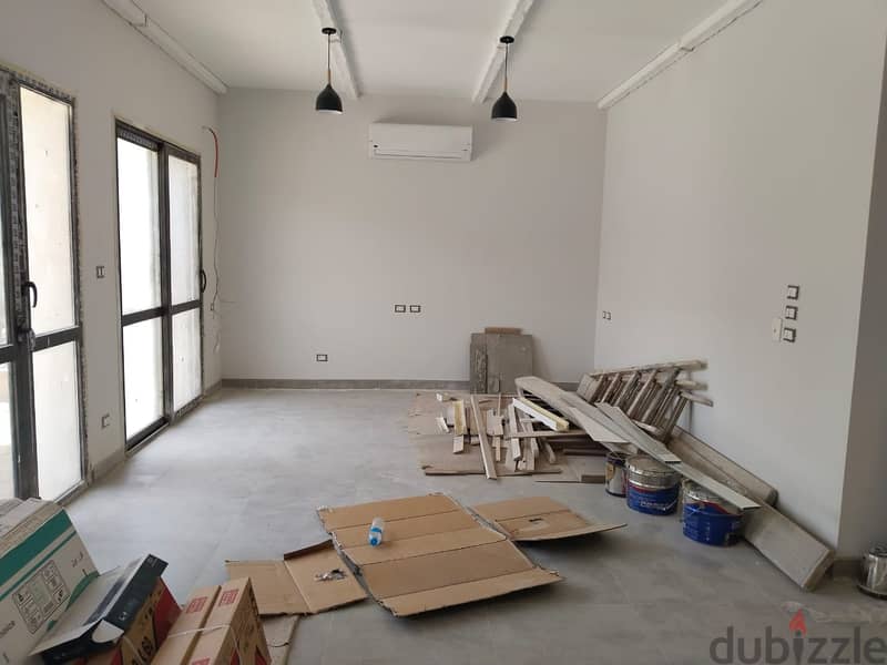 First Hand Apartment 200m for rent with garden 60m in a  Eastown - SODIC ( Kitchen - appliances - air conditioners ) 1