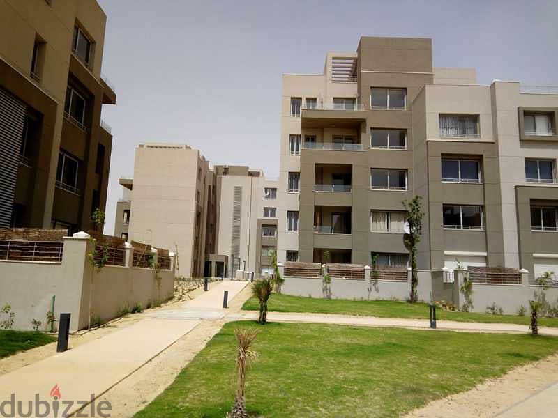 Apartment for rent (kitchen + appliances + air conditioners) in Village Gate compound - In front of the American University 3