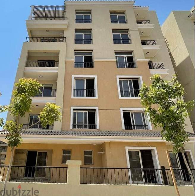 Triplex with direct view, 220 m, roof 127 m, for sale in Sarai Compound near the Administrative Capital and Madinaty, with a down payment starting fro 2