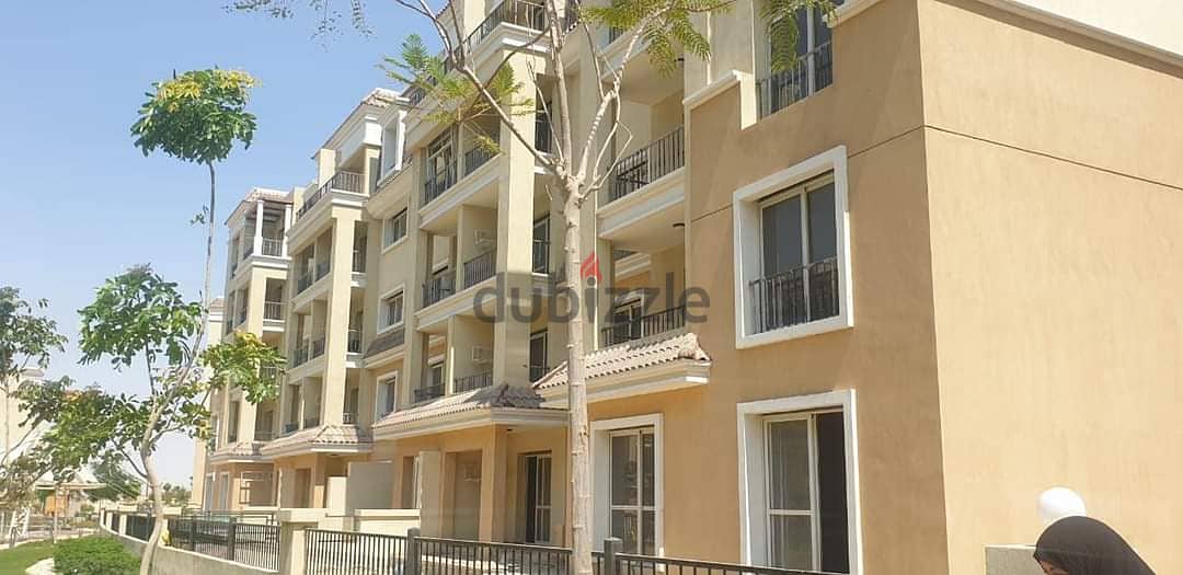 Triplex with direct view, 220 m, roof 127 m, for sale in Sarai Compound near the Administrative Capital and Madinaty, with a down payment starting fro 5