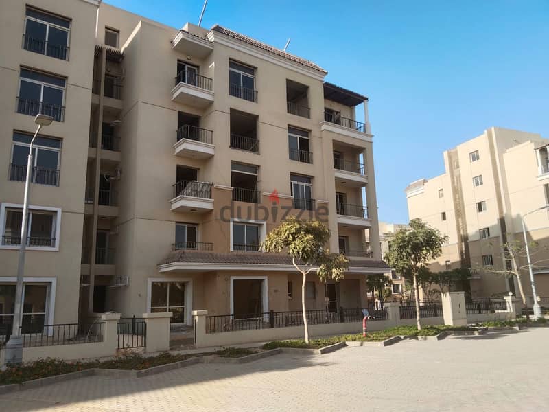 Triplex with direct view, 220 m, roof 127 m, for sale in Sarai Compound near the Administrative Capital and Madinaty, with a down payment starting fro 14
