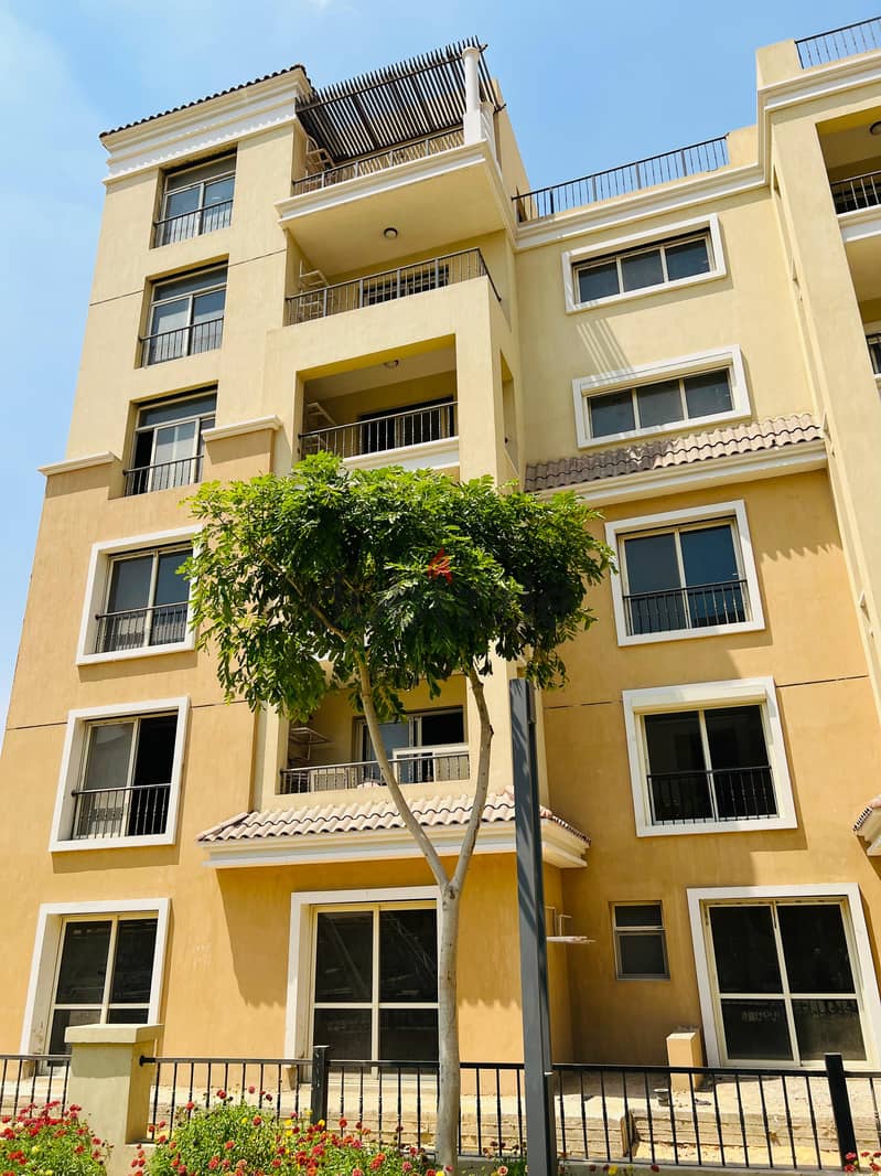 Triplex with direct view, 220 m, roof 127 m, for sale in Sarai Compound near the Administrative Capital and Madinaty, with a down payment starting fro 22