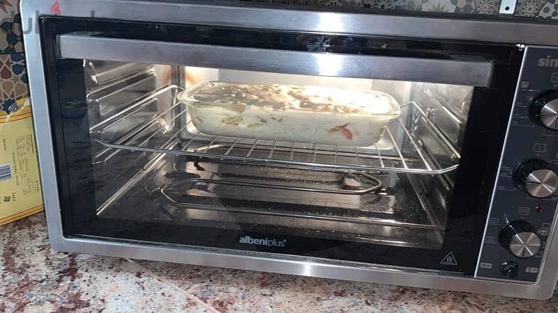 simfer oven 45 فرن كهربائي 45 لتر مزود بشوايه التربو ومروحه لون سيلفر 1