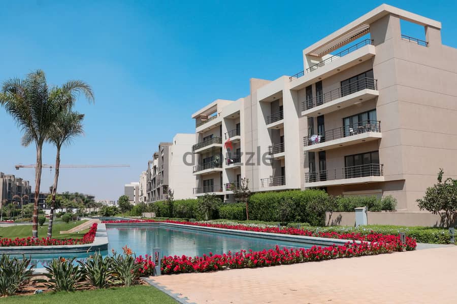 for sale apartment 200m with garden finished with ACs & kitchen phase 1 special view in compound 12