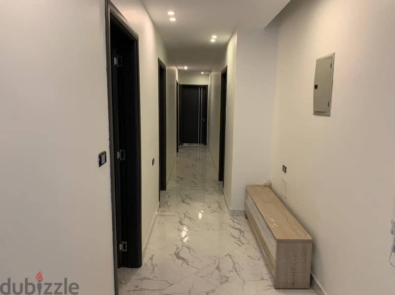 For sale in the heart of Sheikh Zayed, a luxury hotel apartment in ZED West Towers (fully finished + ACs) 4