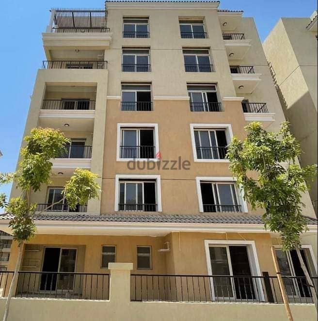 Ground floor apartment 111 sqm + garden 129 sqm, 42% discount in the Fifth Settlement, directly on the Suez Road, Sarai New Cairo Compound 2