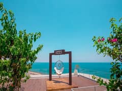 With a 5% down payment, I own a chalet for sale in Monte Galala, Ain Sokhna Distinctive view on the sea and lagoon ready to move  Prime Location *