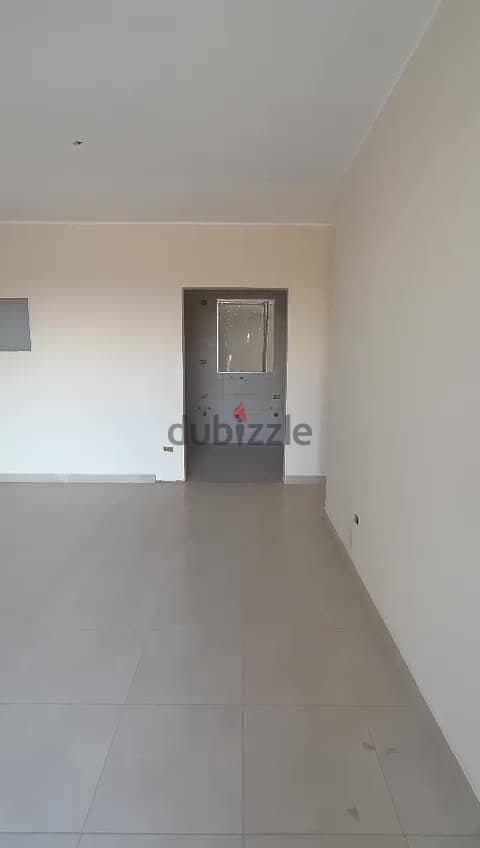 Studio for sale in Nour City, 67 sqm, old reservation, excellent location, opposite services in B1 4