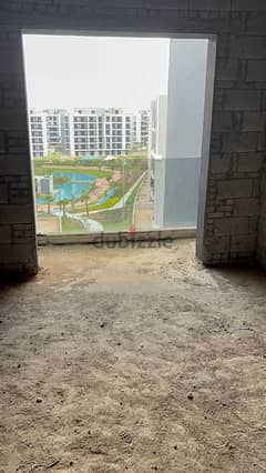 Apartment for sale with a wonderful view  In Trio Gardens Compound