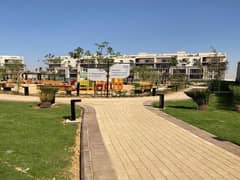 Resale apartment with private garden in October Plaza Compound in 6th of October 0