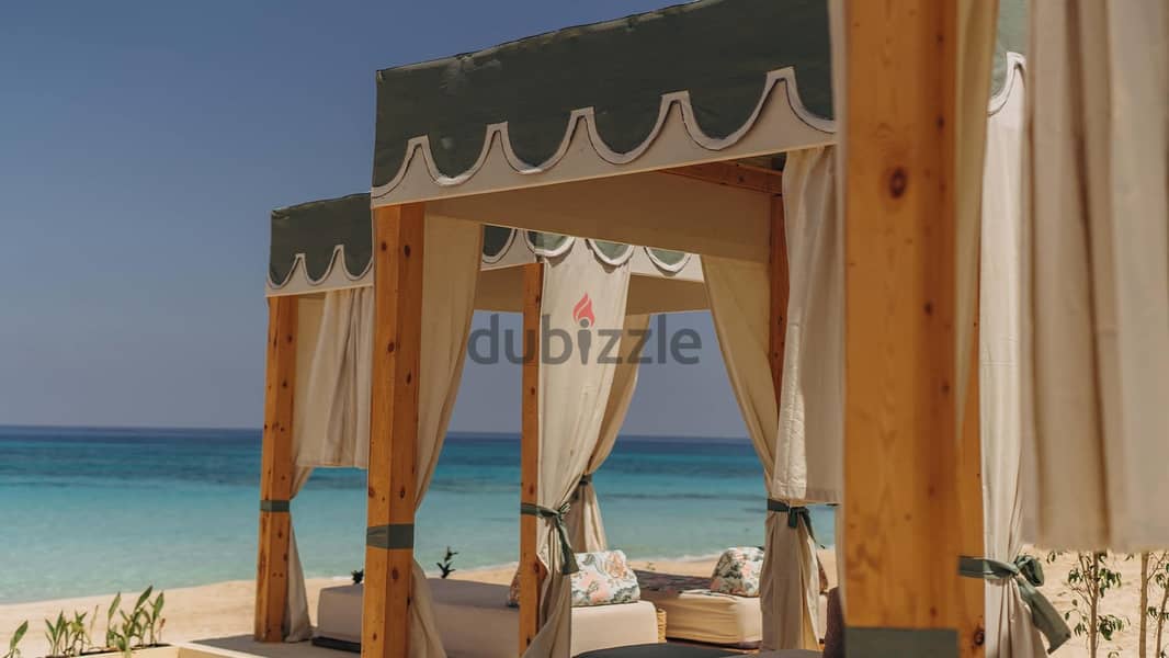 chalet for sale, finished, with kitchen and air conditioners, in Azha Ras El Hekma, with a view on crystal lagoon sea view installments over 8 years 8